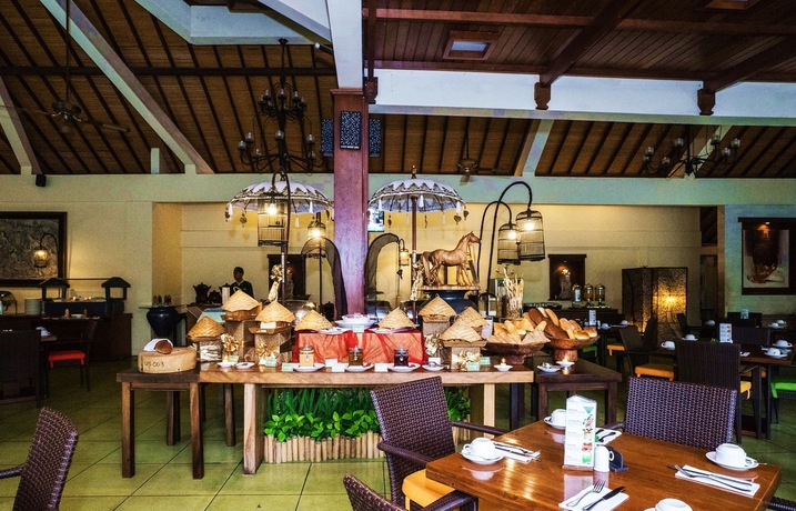 Imagen del bar/restaurante del Hotel Risata Bali Resort y Spa. Foto 8