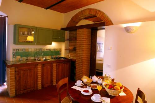 Imagen de la habitación del Hotel Riserva Di Fizzano Residence. Foto 10