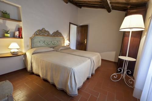 Imagen de la habitación del Hotel Riserva Di Fizzano Residence. Foto 12