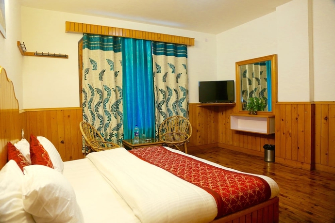 Imagen de la habitación del Hotel Rishi Palace. Foto 9