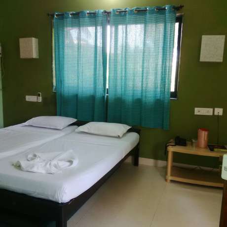 Imagen de la habitación del Hotel Rishi Prasad. Foto 15