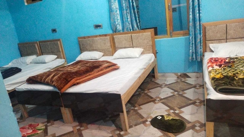 Imagen de la habitación del Hotel Rishi River View. Foto 2