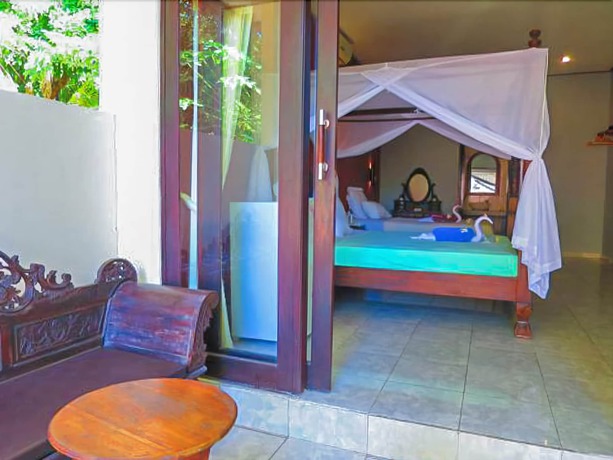 Imagen de la habitación del Hotel Rising Star Beach Resort Amed. Foto 8