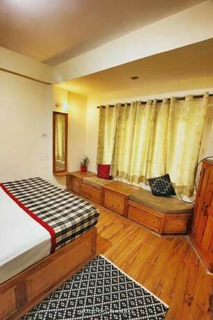 Imagen de la habitación del Hotel Rising Star. Foto 15