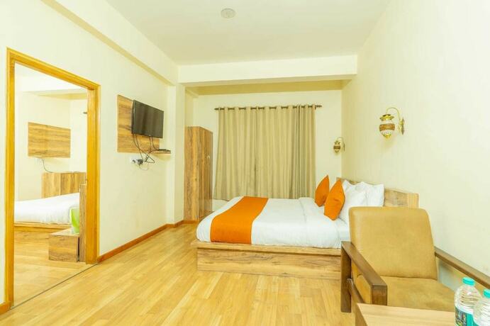 Imagen de la habitación del Hotel Rising Star. Foto 16