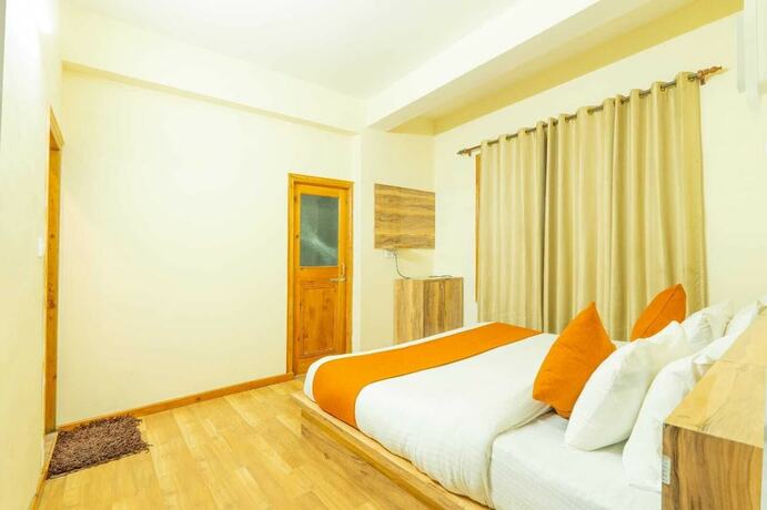 Imagen de la habitación del Hotel Rising Star. Foto 17