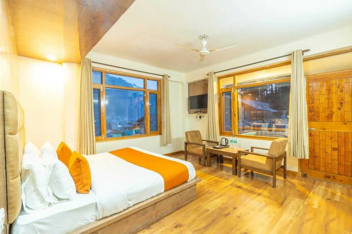 Imagen de la habitación del Hotel Rising Star. Foto 18