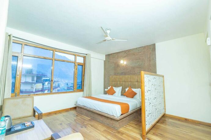 Imagen de la habitación del Hotel Rising Star. Foto 20