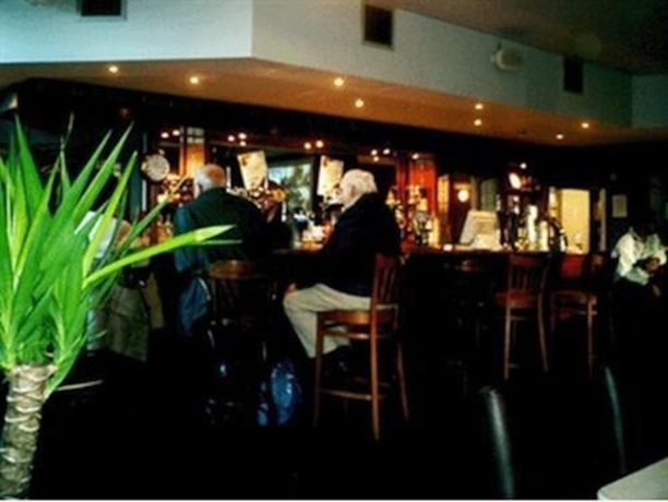 Imagen del bar/restaurante del Hotel Rising Sun Hotel. Foto 4