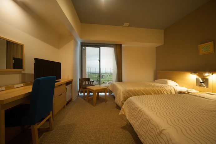 Imagen de la habitación del Hotel Rising Sun Miyakojima. Foto 4