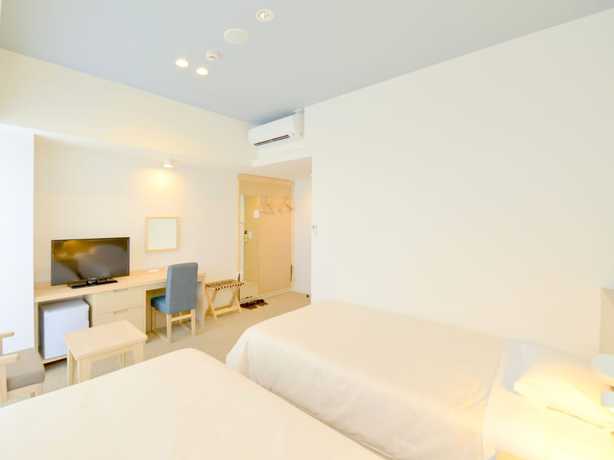 Imagen de la habitación del Hotel Rising Sun Miyakojima. Foto 6