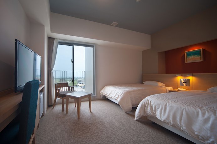 Imagen de la habitación del Hotel Rising Sun Miyakojima. Foto 13