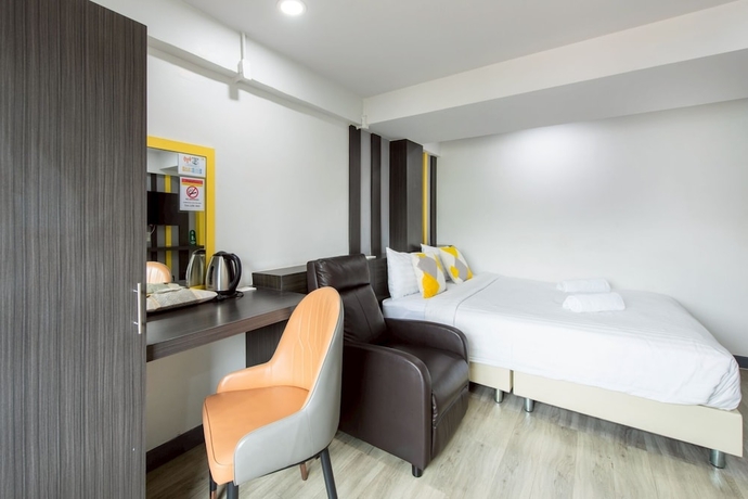 Imagen de la habitación del Hotel Riski Residence Bangbuathong. Foto 10