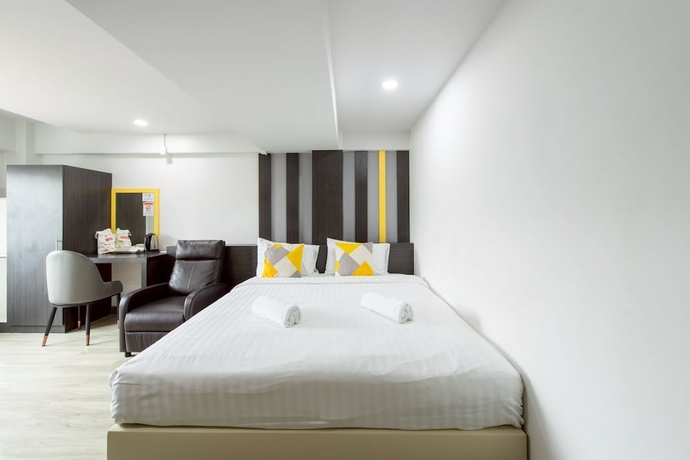 Imagen de la habitación del Hotel Riski Residence Bangbuathong. Foto 11