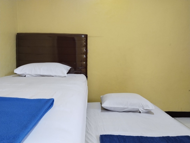 Imagen de la habitación del Hotel Risqia Homestay Syariah by Cocotel. Foto 4