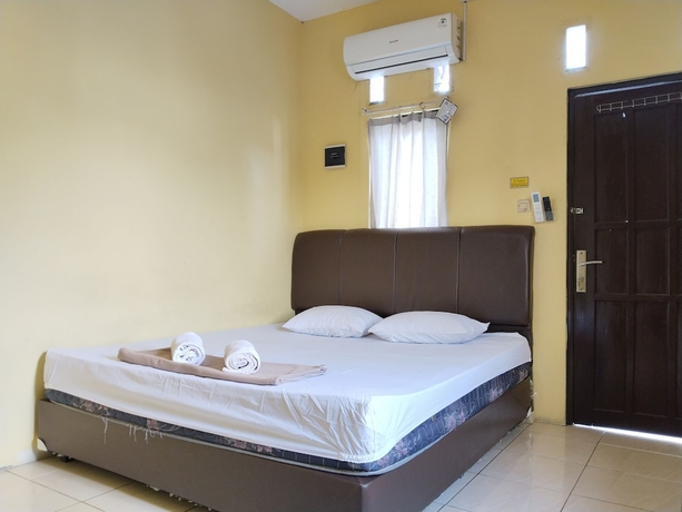 Imagen de la habitación del Hotel Risqia Homestay Syariah by Cocotel. Foto 5