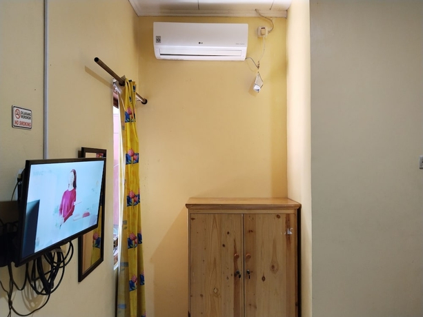 Imagen de la habitación del Hotel Risqia Homestay Syariah by Cocotel. Foto 7