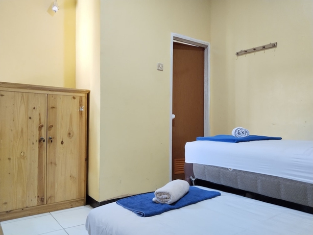 Imagen de la habitación del Hotel Risqia Homestay Syariah by Cocotel. Foto 8