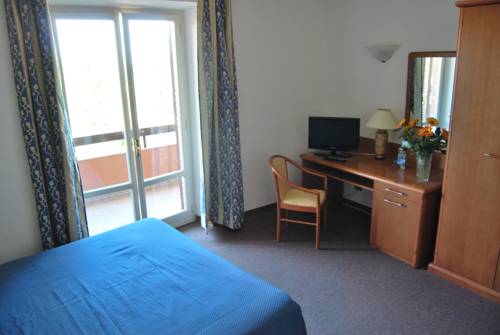 Imagen de la habitación del Hotel Ristorante Il Gabbiano, Passignano Sul Trasimeno. Foto 11