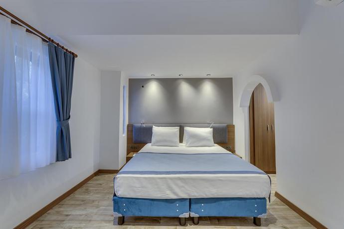 Imagen de la habitación del Hotel Risus Garden Marina. Foto 6