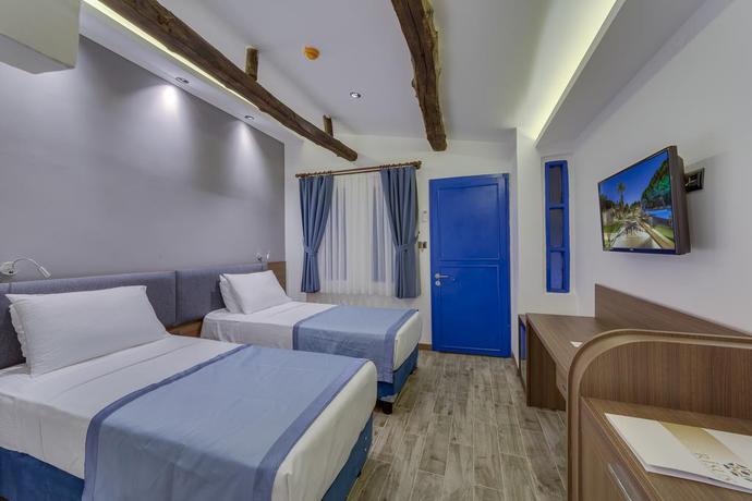 Imagen de la habitación del Hotel Risus Garden Marina. Foto 9