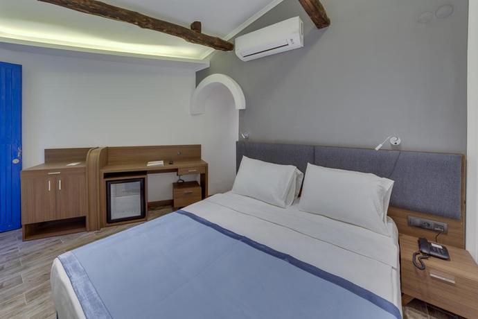 Imagen de la habitación del Hotel Risus Garden Marina. Foto 10