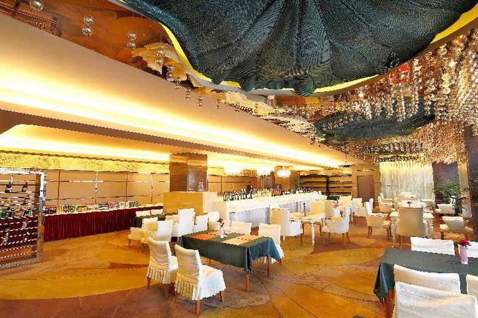 Imagen del bar/restaurante del Hotel Ritan Hotel Downtown Beijing. Foto 3