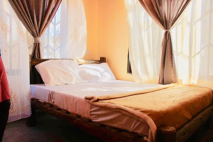 Imagen de la habitación del Hotel Ritungu Camp. Foto 13