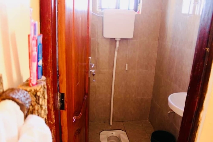 Imagen de la habitación del Hotel Ritungu Camp. Foto 17