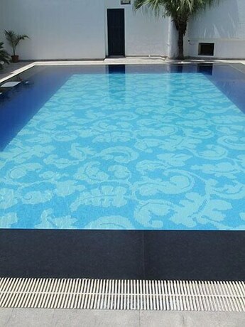 Imagen de la piscina del Hotel Ritz Plaza, Amritsar. Foto 34