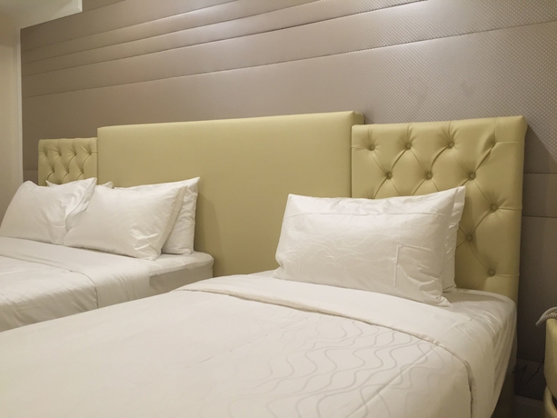Imagen de la habitación del Hotel Ritzton. Foto 18