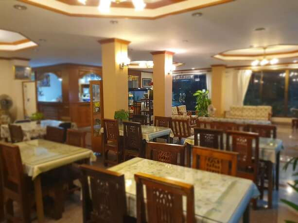 Imagen del bar/restaurante del Hotel Ritzy House. Foto 18