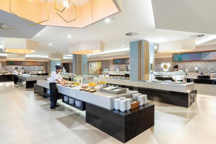 Imagen del bar/restaurante del Hotel Riu Buenavista All Inclusive. Foto 3