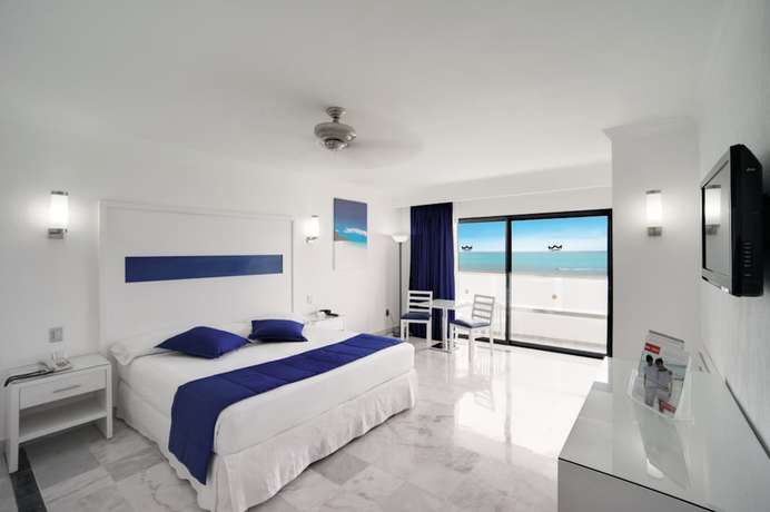 Imagen de la habitación del Hotel Riu Caribe All Inclusive. Foto 5