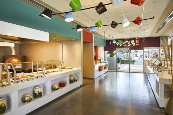 Imagen del bar/restaurante del Hotel Riu Dubai Beach Resort - All Inclusive. Foto 3