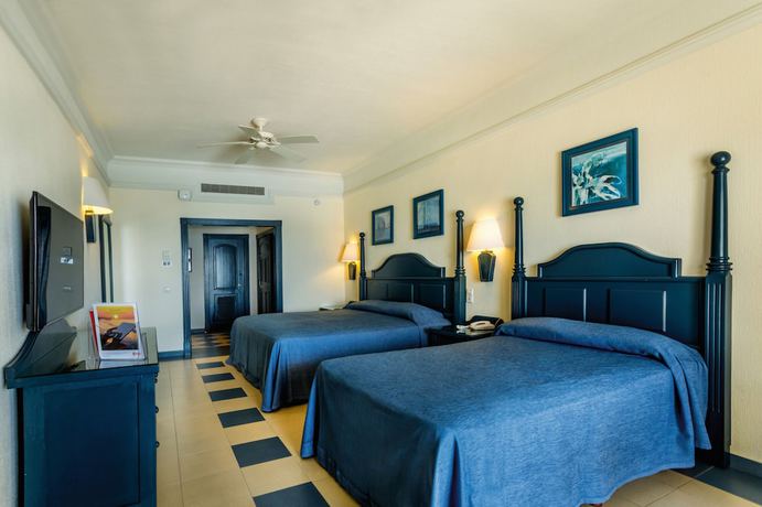 Imagen de la habitación del Hotel Riu Emerald Bay. Foto 12