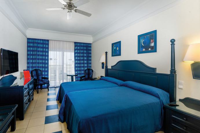 Imagen de la habitación del Hotel Riu Emerald Bay. Foto 13