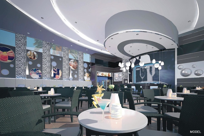 Imagen del bar/restaurante del Hotel Riu Playacar All Inclusive. Foto 8