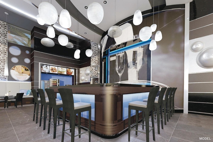 Imagen del bar/restaurante del Hotel Riu Playacar All Inclusive. Foto 10