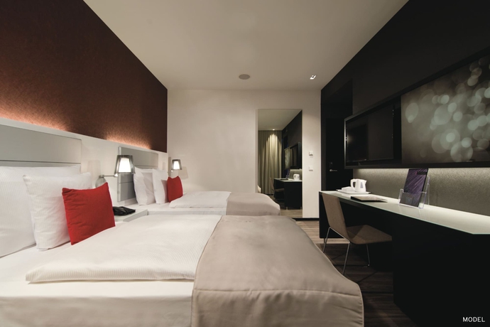 Imagen de la habitación del Hotel Riu Plaza Berlin. Foto 12