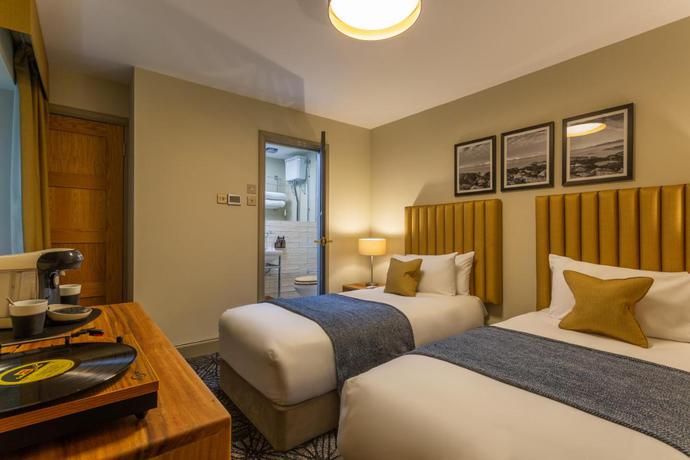 Imagen de la habitación del Hotel Riva Boutique. Foto 6