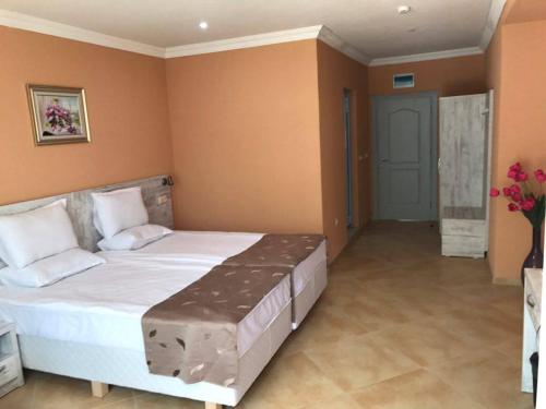Imagen de la habitación del Hotel Riva Park - All Inclusive. Foto 17