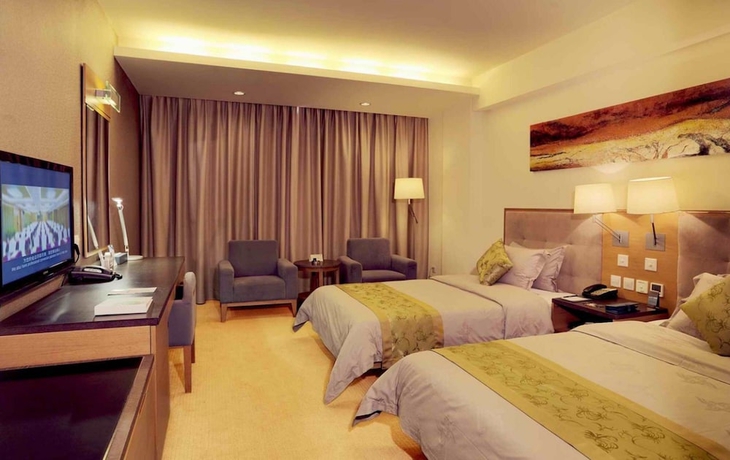 Imagen de la habitación del Hotel Rivan Longgang Shenzhen. Foto 10