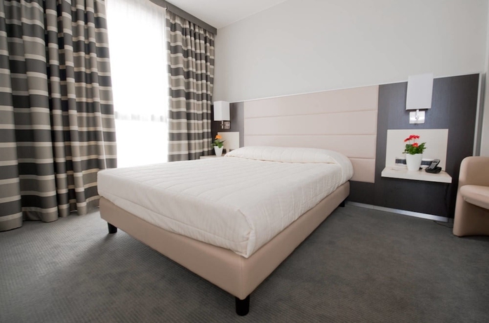 Imagen de la habitación del Hotel Rivarolo. Foto 9