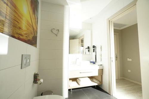 Imagen de la habitación del Hotel Riva's Moda. Foto 7