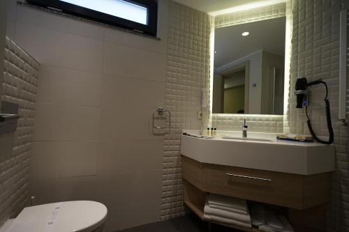 Imagen de la habitación del Hotel Riva's Moda. Foto 8