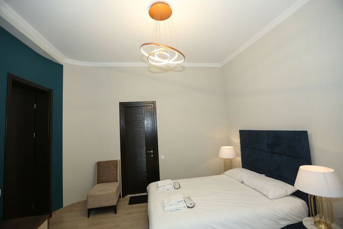 Imagen de la habitación del Hotel Rivendell Umbrella Collections. Foto 12