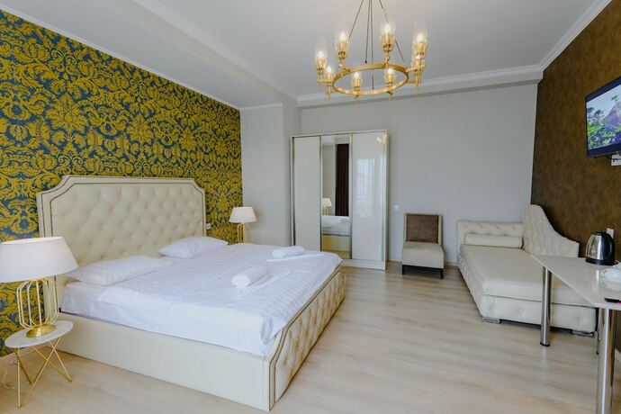 Imagen de la habitación del Hotel Rivendell Umbrella Collections. Foto 13