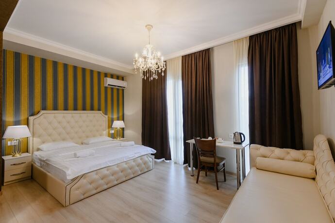 Imagen de la habitación del Hotel Rivendell Umbrella Collections. Foto 14