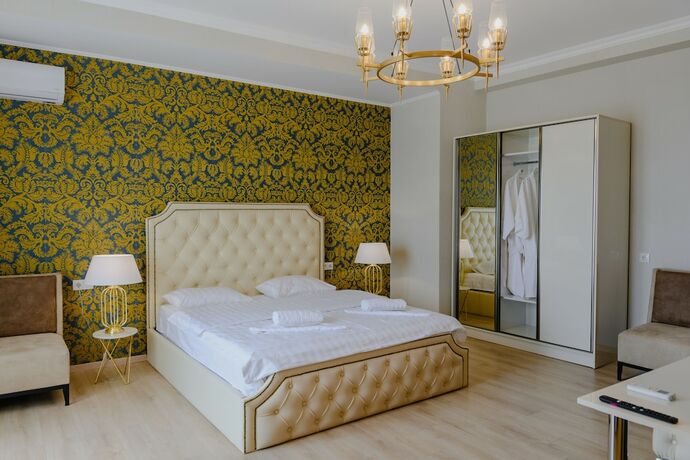 Imagen de la habitación del Hotel Rivendell Umbrella Collections. Foto 15